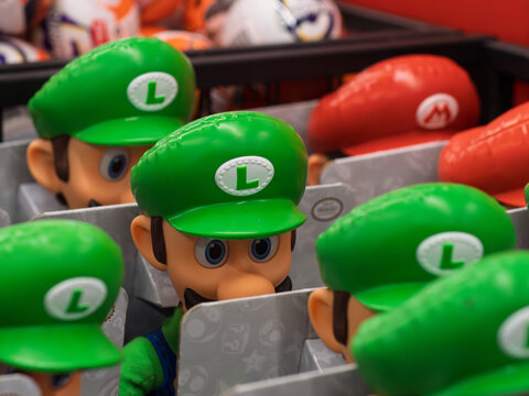 Luigi Action Figures on Display in Store Aisle