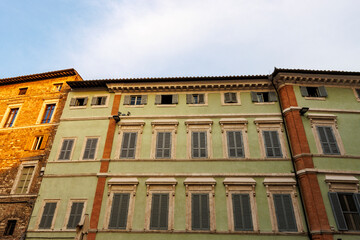 Facade of old houses in the historic center of Perugia, Umbria, Italy, Europe