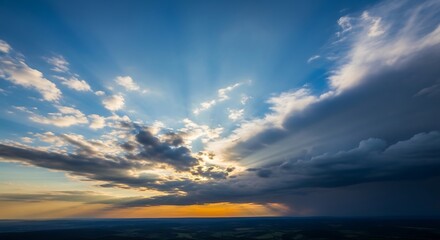Beautiful sunset with dramatic clouds and sun rays.