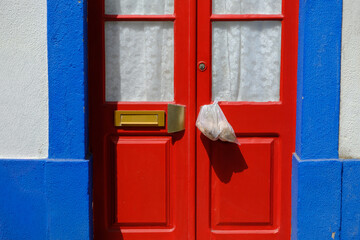 Red wood doors from a Traditional Portuguese house