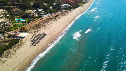 aerial view of the Playa Monteros and the golf course at the Mediterranean Sea near Marbella, view along the Costa del Sol in the summer, Andalusia, Spain