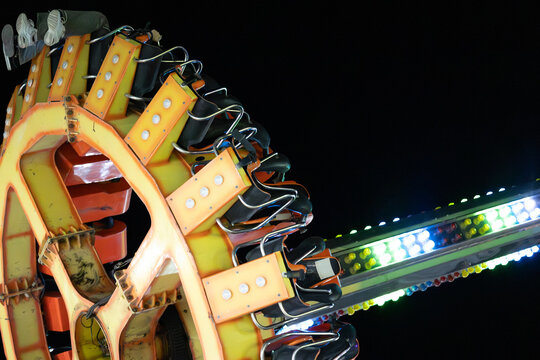 Thrill in Motion: The Spinning Tagada Ride Tossing Riders Around