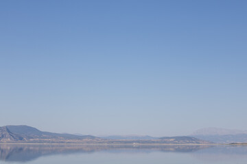 Midday Serenity by the Lake A Majestic View Framed by Mountains sun