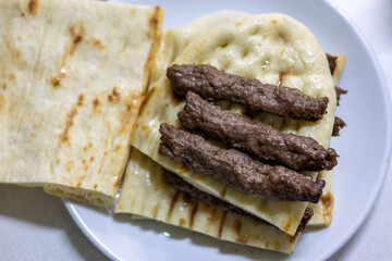 Burdur-Style Skewers Served with Flatbreads  A Taste of Tradition in a Local Eatery