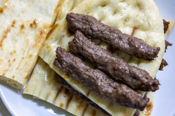 Burdur-Style Skewers Served with Flatbreads  A Taste of Tradition in a Local Eatery