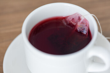 A Cozy Cup: Red Tea in a White Mug – A Simple Restaurant Delight