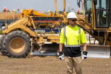 Civil construction engineering. Man engineer at building site. Supervisor worker wear uniform. Top supervisor at work. Labor day. Building side outdoor. Man at construction site. Coordinating staff