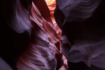 The tunnel inside the antelope canyon. The undulating rocks extending deep into the canyon are clearly visible