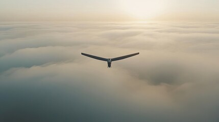 Drone soaring above clouds at sunrise