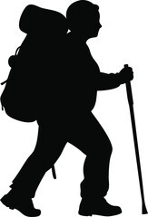 Silhouette of a person hiking with a large backpack and trekking poles exploring nature and wilderness adventure silhouette