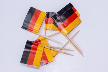 German national flags lying on white background.