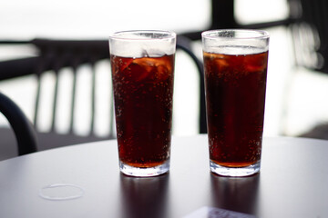 Two Soft Drinks on a Table – Refreshment and Summer Lifestyle Concept
