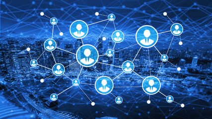 This image illustrates a blue digital network with human icons connected against a cityscape backdrop, symbolizing technology and social interaction in a modern environment. Tessel