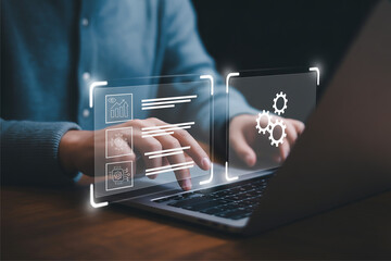 Digital Transformation Interface with Human Interaction on Laptop Featuring System Operations, Gear Icons, and Data Management Overlays