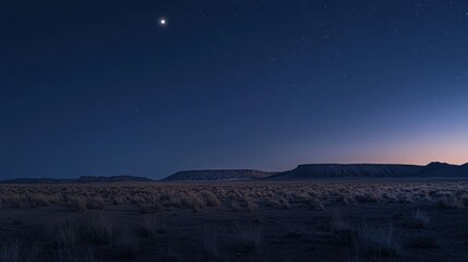 A serene night landscape showcasing a vast desert with distant mountains under a starry sky and a crescent moon.