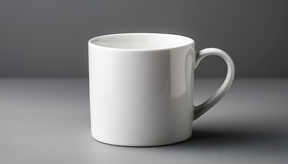 Obraz premium plain white ceramic mug on gray background