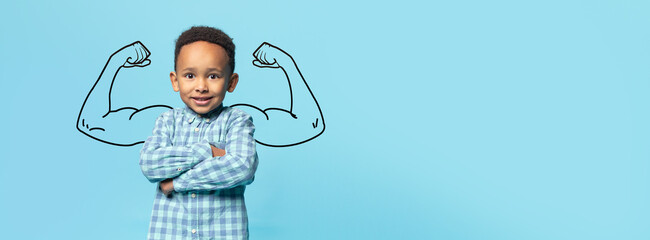 African American young boy confidently poses with his arms crossed, exhibiting drawn biceps behind...