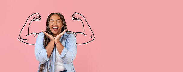 A joyful African American lady stands against a pink background, showcasing exaggerated biceps...