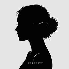 Elegant silhouette of a woman with hair in a bun