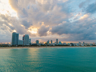 Fototapeta premium Miami cityscape with skyscrapers and ocean. Miami Beach from above. Miami skyline from top.