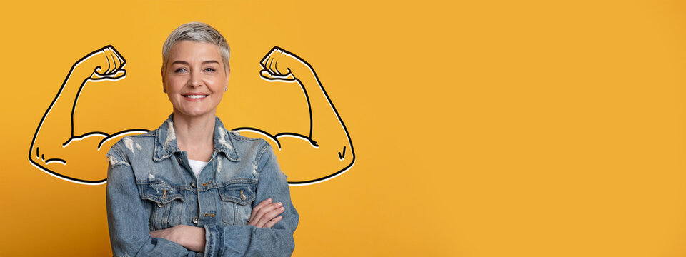 A confident individual stands smiling, showcasing strength with bicep flexing. The bright yellow background enhances the aura of empowerment, embodying a strong spirit in a positive atmosphere.