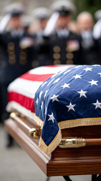 American flag draped on casket during solemn military funeral honors ceremony