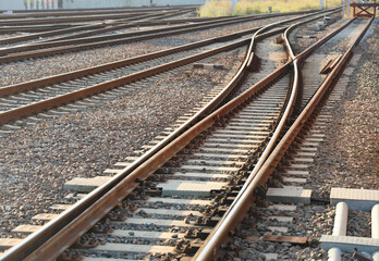 dead end. High angle view of railroad tracks crossing. new modern railway tracks complex junction. concrete piles. crushed stone embankment. perspective view.