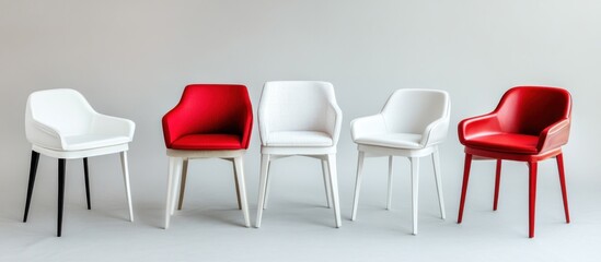 Fototapeta premium Elegant assortment of modern chairs in a studio setting showcasing design