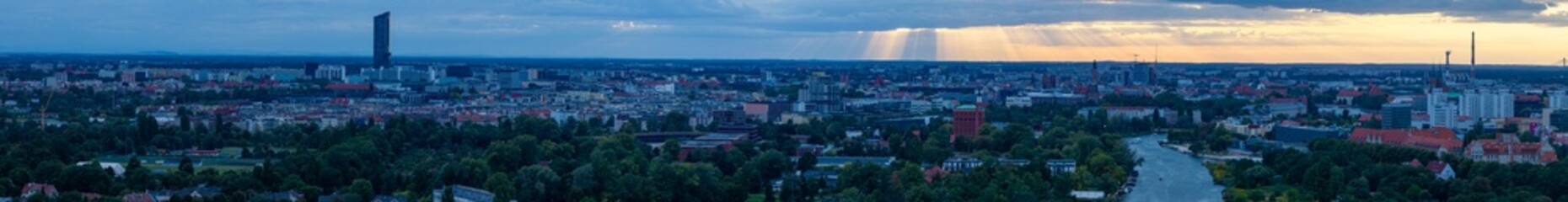 Expansive Wrocław Skyline Panorama with Sunset Sunbeams