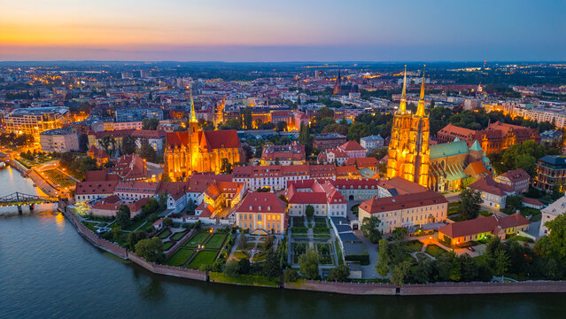 Night view of church of the Holy Cross and St Bartholomew and ca