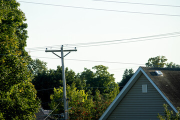 Obraz premium Power lines in the residential neighborhood 