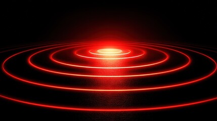 Fototapeta premium Red circles illuminate a dark space