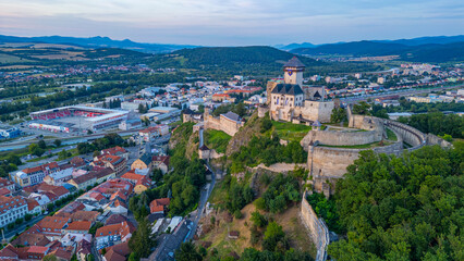 Fototapeta premium Sunset with Trencin castle overlooking the old town, Slovakia