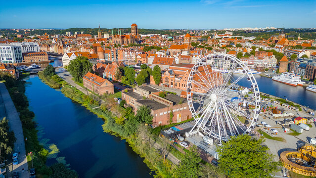 Panorama of Gdansk behind a ferris wheel, Poland