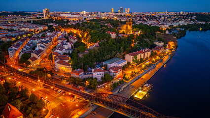Fototapeta premium Sunset view of Vysehrad behind vyton bridge in Prague, Czech rep