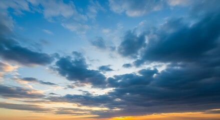 Obraz premium Sunset clouds over a beautiful landscape.
