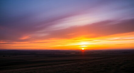 Vibrant Sunset over the Horizon with Colorful Clouds.