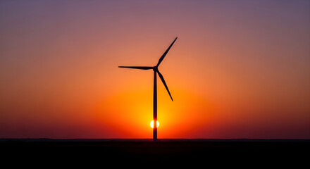 Wind Turbine Silhouette at Sunset.