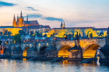 Naklejka premium Sunset panorama of Prague dominated by the Prague castle, Czech