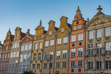 Fototapeta premium Sunrise view of colourful houses at Dlugi Targ square in Gdansk,