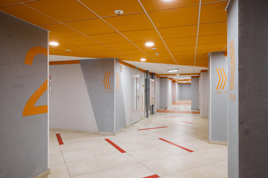 This modern corridor features unique designs that enhance its appeal and functionality