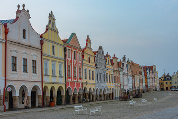 Fototapeta premium Sunrise view of colourful houses at historical square in Telc, C