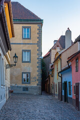 Fototapeta premium Sunset view of The golden lane at the Prague castle, Czech repub