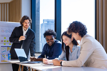 Team of diversity business people are discussing over new strategic strategy project over investment real estate while working inside modern office building for new project and planning