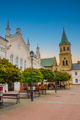 Obraz premium Rynek square and franciscan monastery in Sanok, Poland