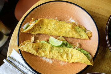 Mexican quesadilla with guacamole and lime