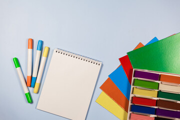 Back to school concept, flat lay of vibrant school or office colorful supplies, school stationery on pink background. flat lay, top view