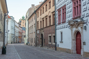 Obraz premium Narrow street in the historical center of Krakow, Poland