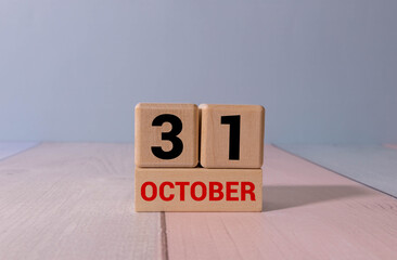 October 31st. Image of October 31 wooden color calendar on white background.