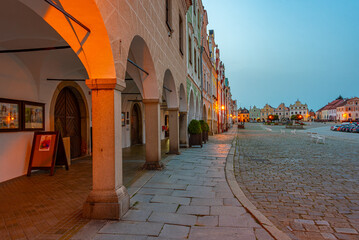 Fototapeta premium Sunrise view of colourful houses at historical square in Telc, C